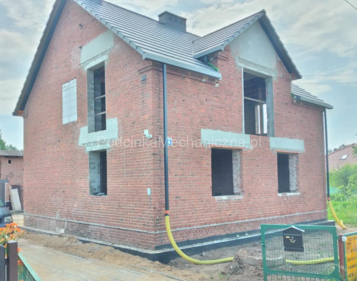 Podcinka mechaniczna budynku Osuszanie domu Wilgoć w domu Krzysztof Ofiera